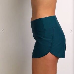 TItle Nine Nalu Paddle Board Swim shorts. Size medium.